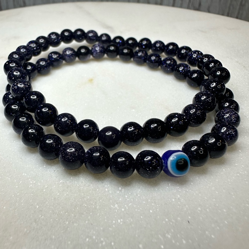 Blue goldstone crystal bracelet 6mm and 8mm beads.